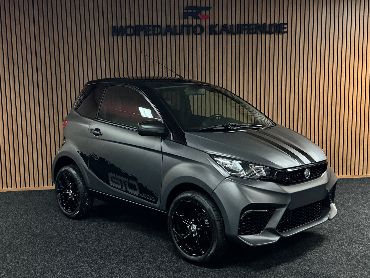 Aixam City Sport MATT GRAU GTO | 2022 | 8 PS Kubota Motor | Rückfahrkamera / Carbon | blaue Gürtel | Innerhalb 250 KM Kostenlose Lieferung | Mopedauto | Leichtmobile | Aixam | Microcar | Ligier