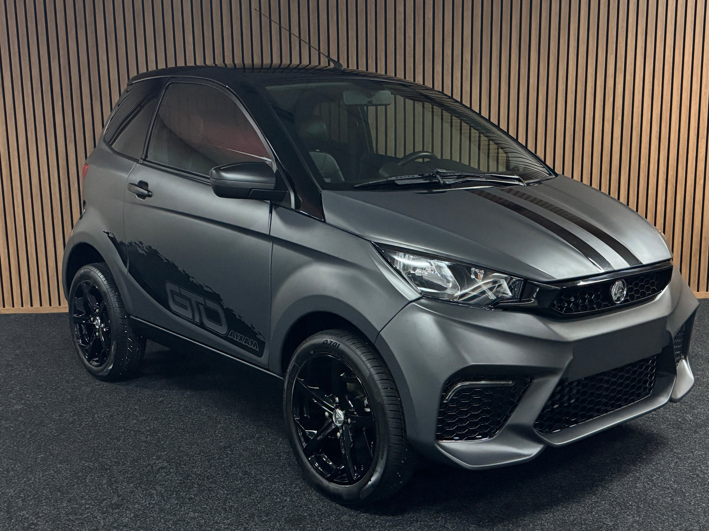 Aixam City Sport MATT GRAU GTO | 2022 | 8 PS Kubota Motor | Rückfahrkamera / Carbon | blaue Gürtel | Innerhalb 250 KM Kostenlose Lieferung | Mopedauto | Leichtmobile | Aixam | Microcar | Ligier